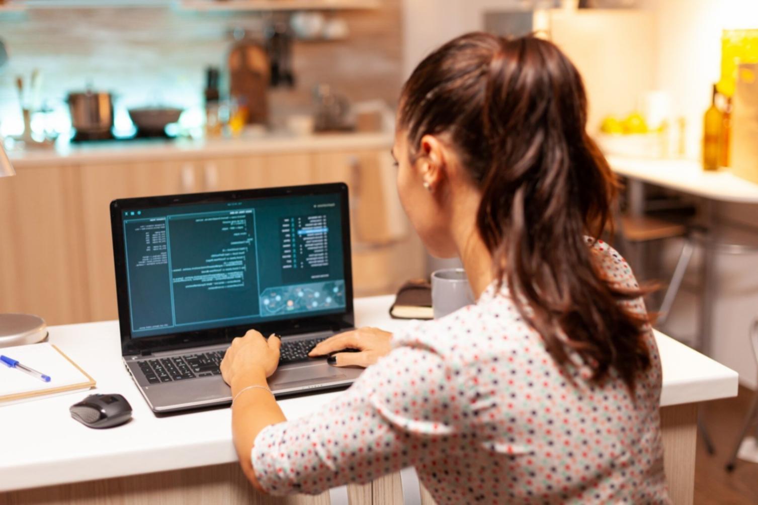 Brand identity development workspace with design tools and materials